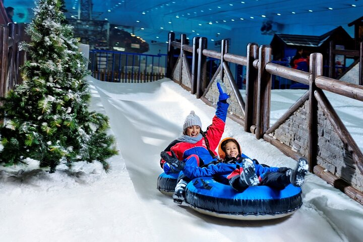 Experience the joy of winter in the desert at Ski Dubai where exhilarating tubing adventures and snow play create unforgettable memories for families and friends alike.